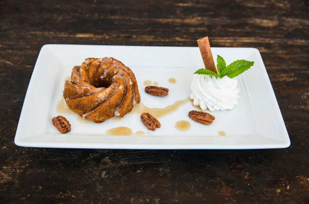 End the night with a sweet treat , other than the free neighborhood candy. Enjoy this Warm Sweet Potato Bunt Cake topped with a local honey glaze and candied pecans at The Westin at the Woodlands: CURRENT.