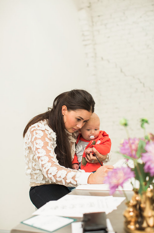 Catherine Lowe practices her calligraphy skills.