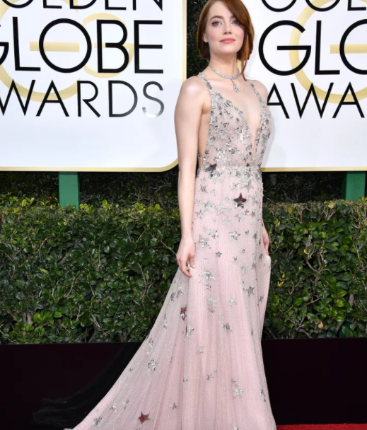 Emma Stone, in Valentino, is skyrocketing to this year's podium to claim all that's hers.