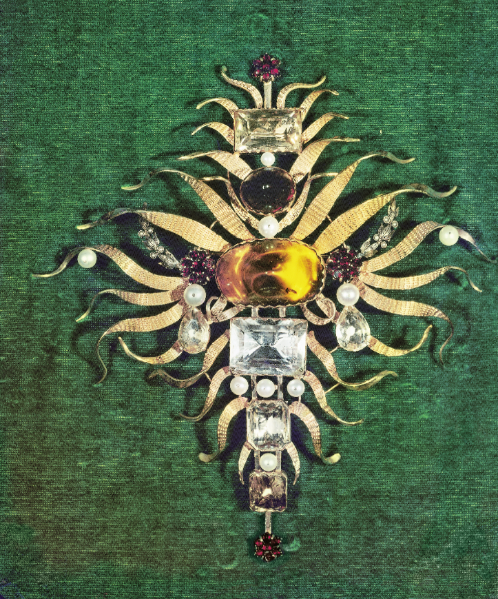 Tony Duquette-designed one-of-a-kind brooch with amber, citrines, pearls, and antique Victorian garnets