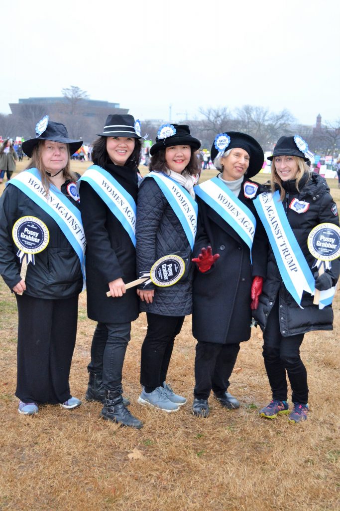 Solidarity. While these signs are anti-Trump, the larger take away was about equal rights. 