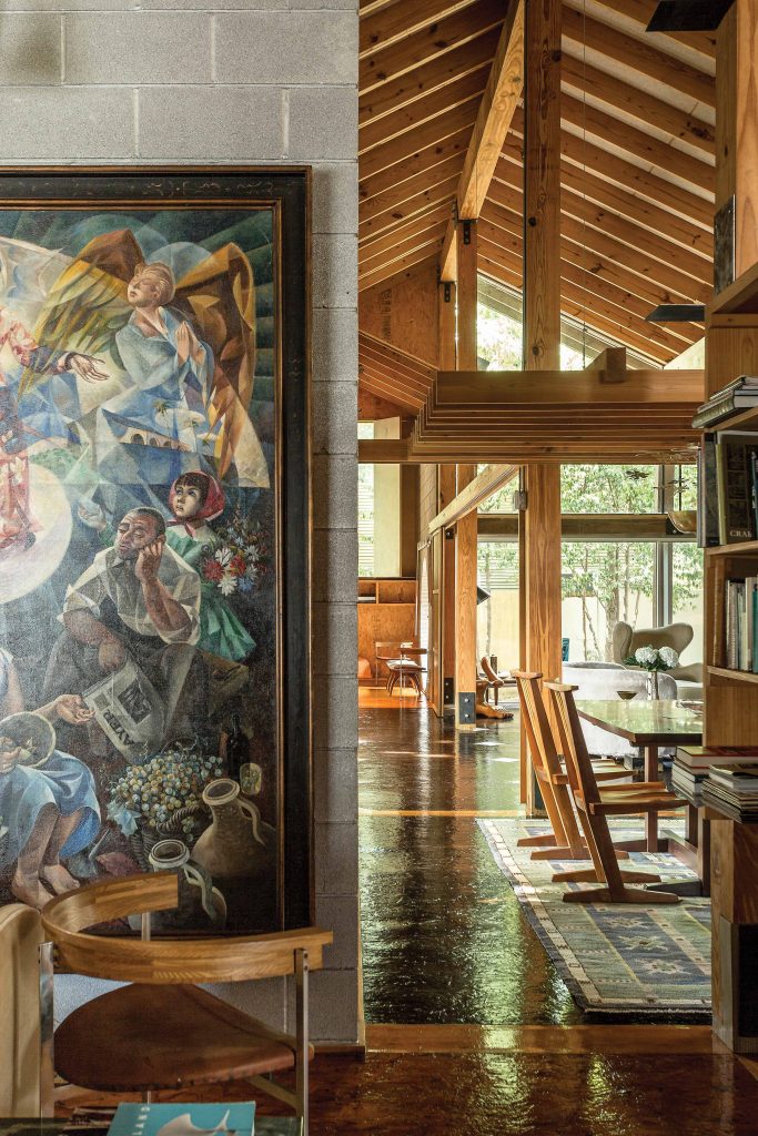 Beams of Southern yellow pine reflect the architect’s reverence for nature. The beams and spine of the house recall vernacular farmhouse architecture as well as minkas, traditional Japanese country homes. Painting by an unknown Mexican artist, dated 1957.