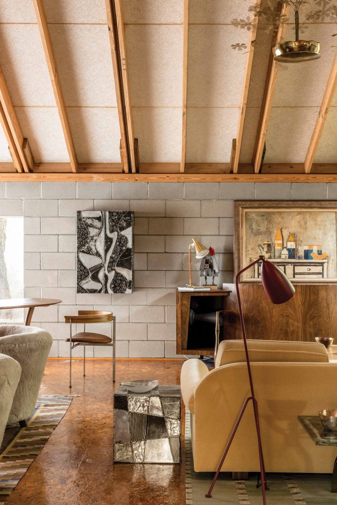 Paul Evans Argente cube, Greta Grossman Grasshopper lamp, and a Paavo Tynell Snowflake chandelier.