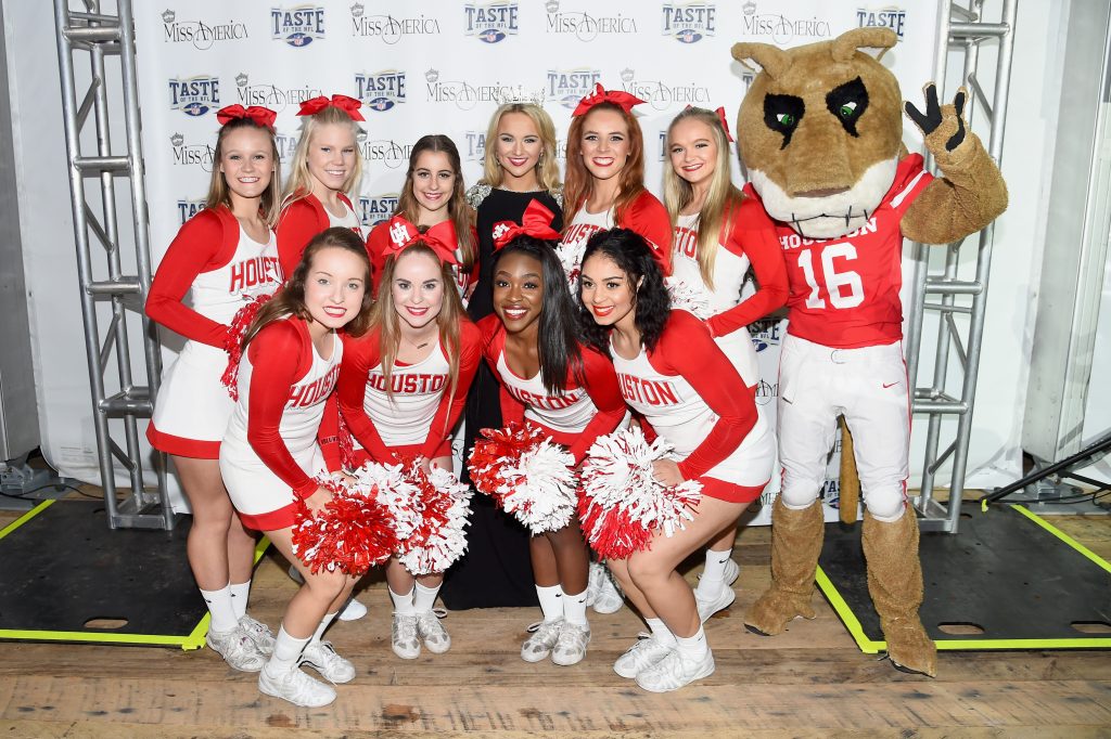 HOUSTON, TX - FEBRUARY 04:  Miss America 2017 Savvy Shields and the Houston Cougar Cheerleaders attend the Taste Of The NFL 'Party With A Purpose' at Houston University on February 4, 2017 in Houston. at University of Houston on February 4, 2017 in Houston, Texas.  (Photo by Nicholas Hunt/Getty Images for Taste Of The NFL)