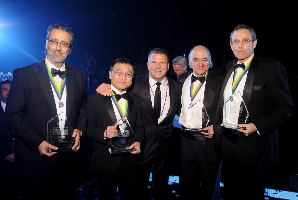 The honorees on stage with Tilman Fertitta at the San Luis Salute "Space Pirates" at the Galveston Island Convention Center Friday February 24,2017. (Dave Rossman Photo)