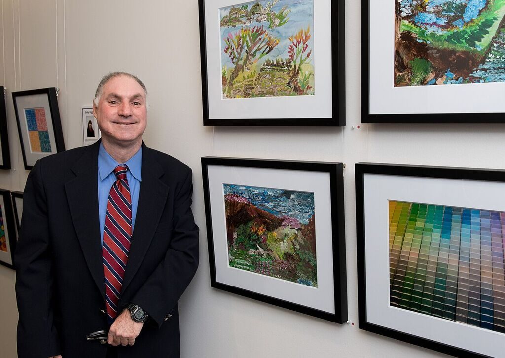 Celebration talent Neville Karpas with his artwork. (Photo Mark Katz)