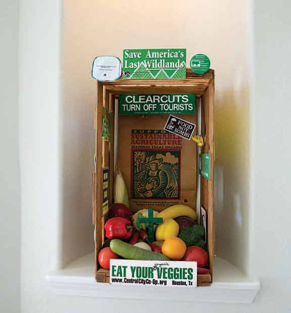 In a wall nook, a sculpture from Prince's ongoing series "Save America" 