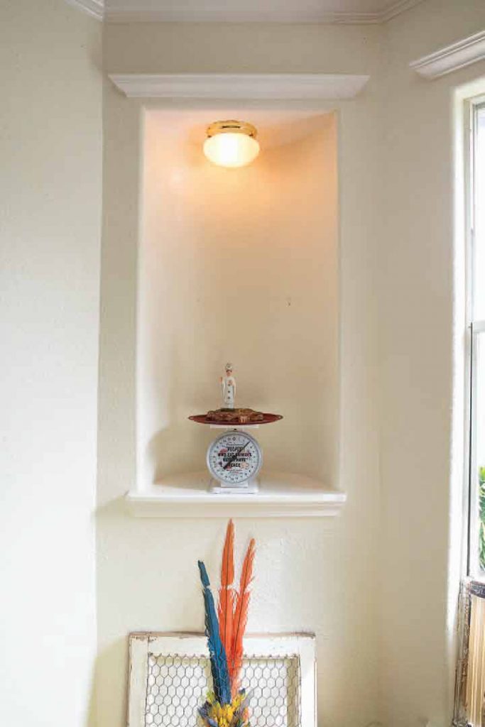 A room in Prince's modest, immaculately kept dwelling serves as a studio. The desk-sized sculpture in the niche, "People Who Eat Animals Never Have Any Peace,"2014, says it all bout the artist's philosophy. 