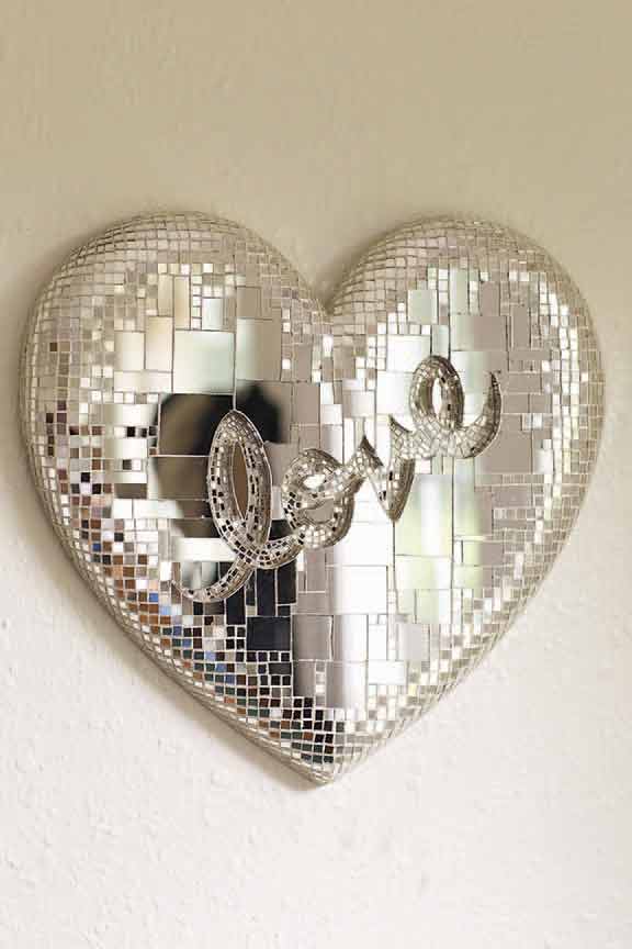 In 1980, Prince began his series of mirrored hearts bearing the text "Love" spelled out in cursive. 