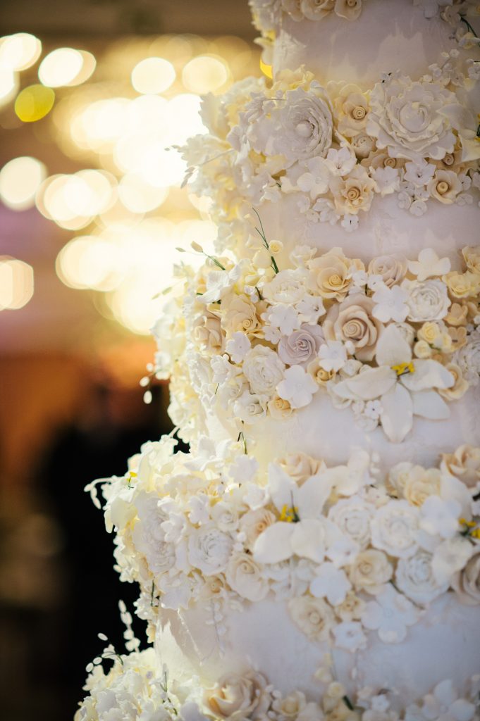 The seven-tiered wedding cake was created by Who Made the Cake.