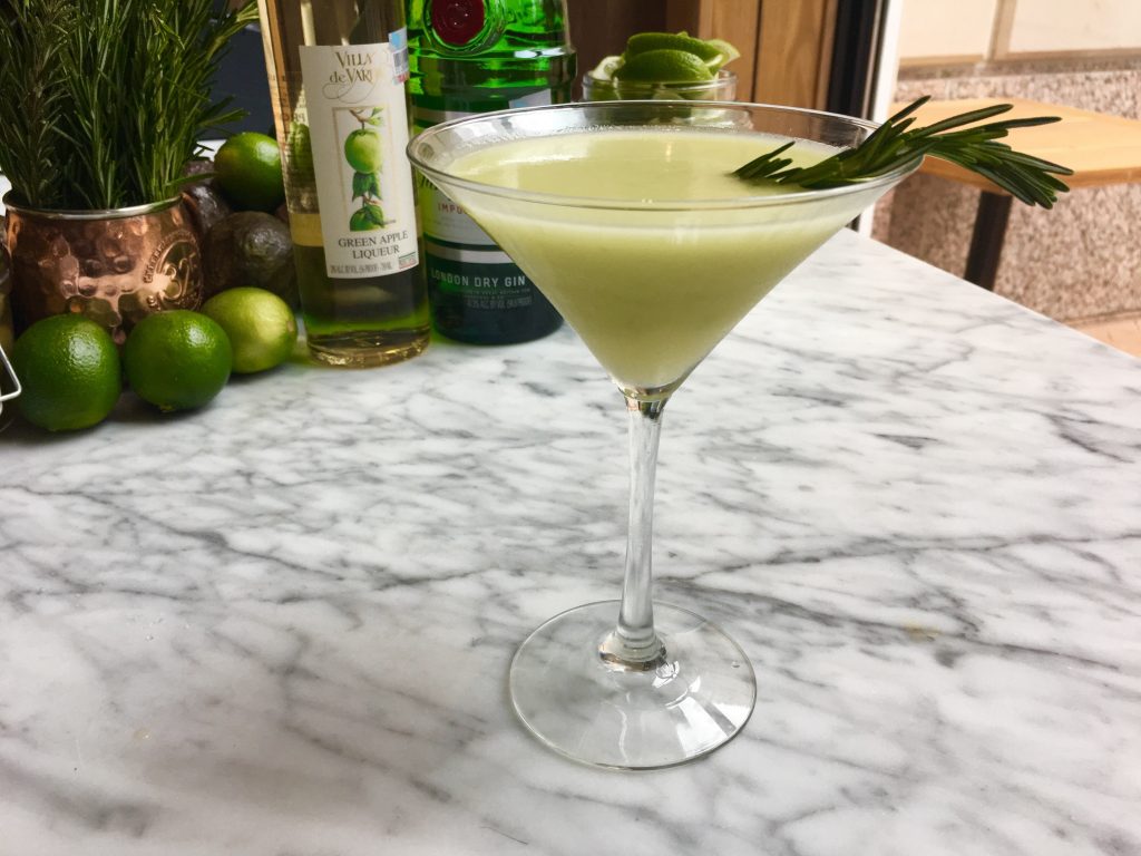 Moxie's avocado gimlet combines rosemary- and olive-infused gin, avocado, apfelkorn (an apple-flavored liqueur), simple syrup, and fresh lime juice.