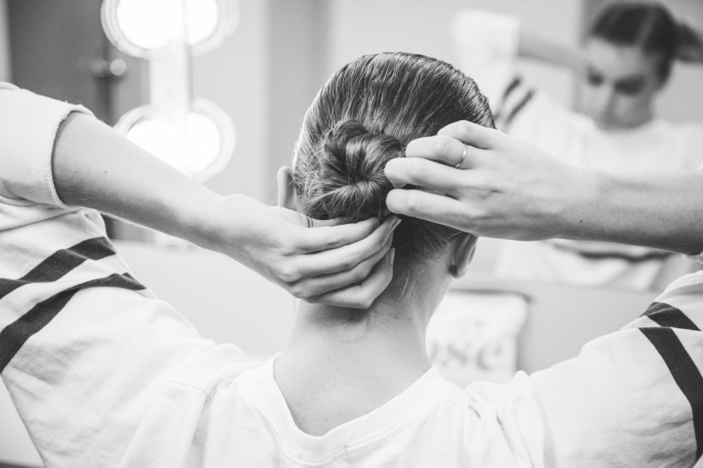 Bridget Kuhns, demi soloist at Houston Ballet, prepares for a dress rehearsal of the company's latest triple bill, Legends and Prodigy, at the Wortham Theater Center.
