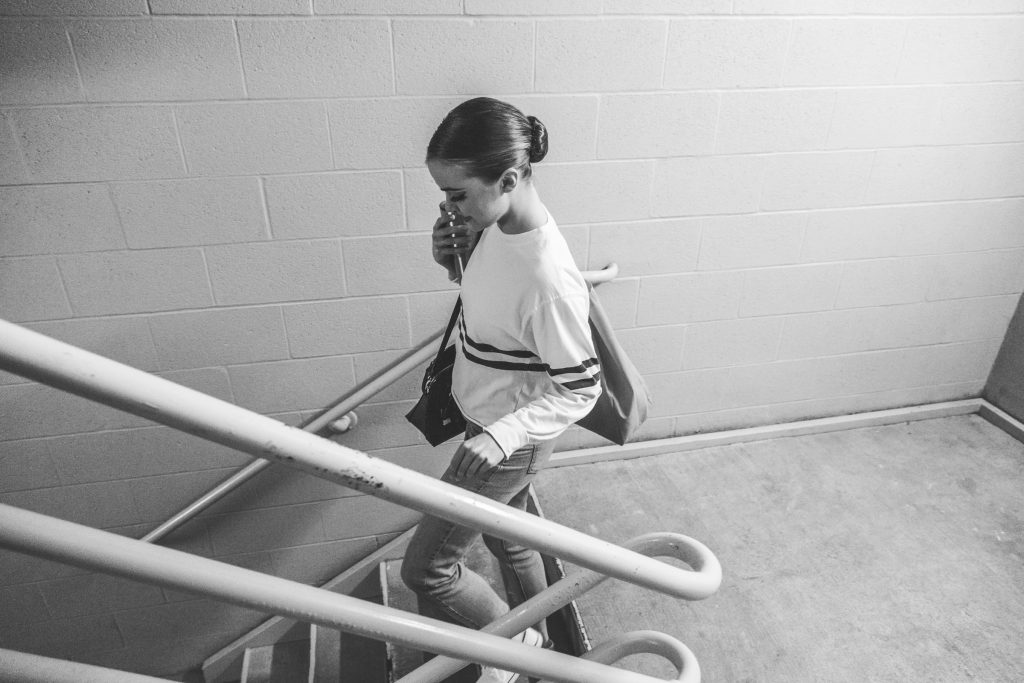 After entering the theater, Kuhns makes her way downstairs to her dressing room.