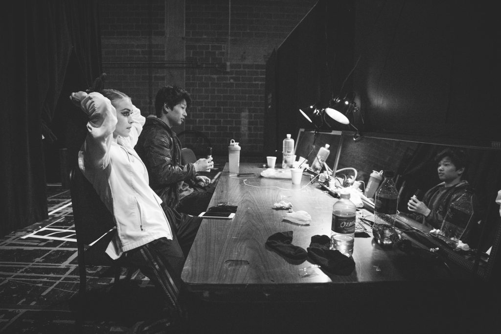 Bridget Kuhns goes over notes before taking the stage.