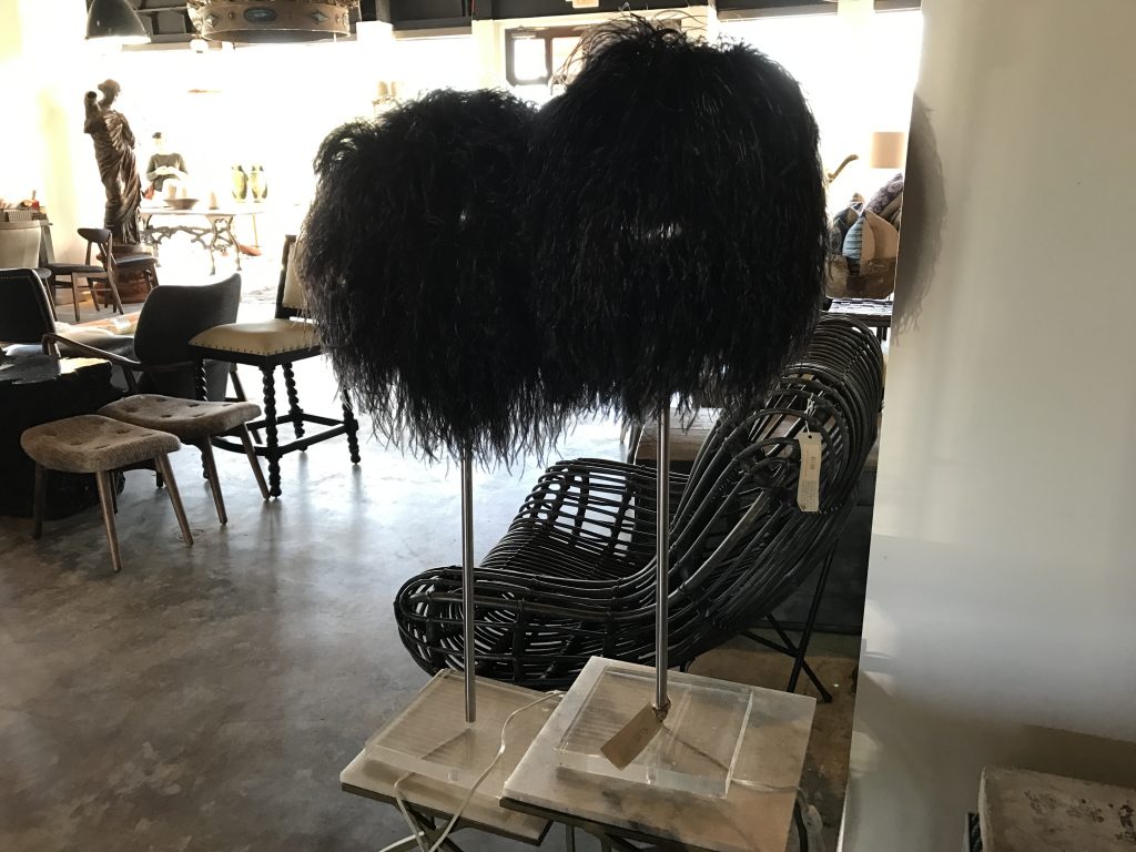 Georgia Brown Home is known for its whimsical accents, like these feather lamps with lucite bases, which retail for $250 each.