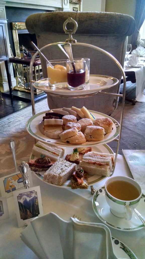 Delectable and rich three-tired dessert and sandwich platter at The Merrion Hotel. 