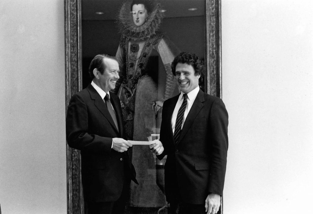 Peter Marzio receiving check from Meredith Long of the Houston Art Dealers Association, April 1984.