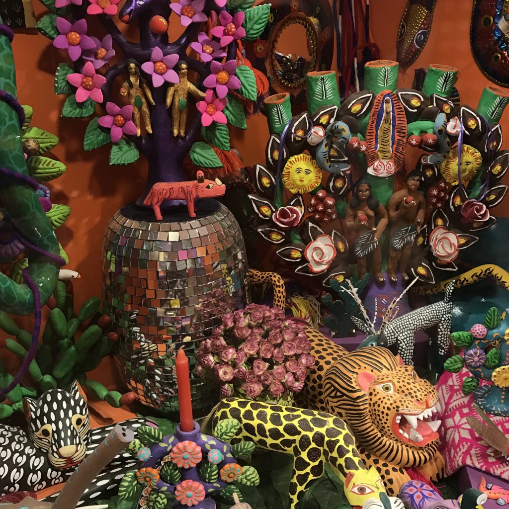 Tableau of Mexican folk art, a plethora of color and textures.