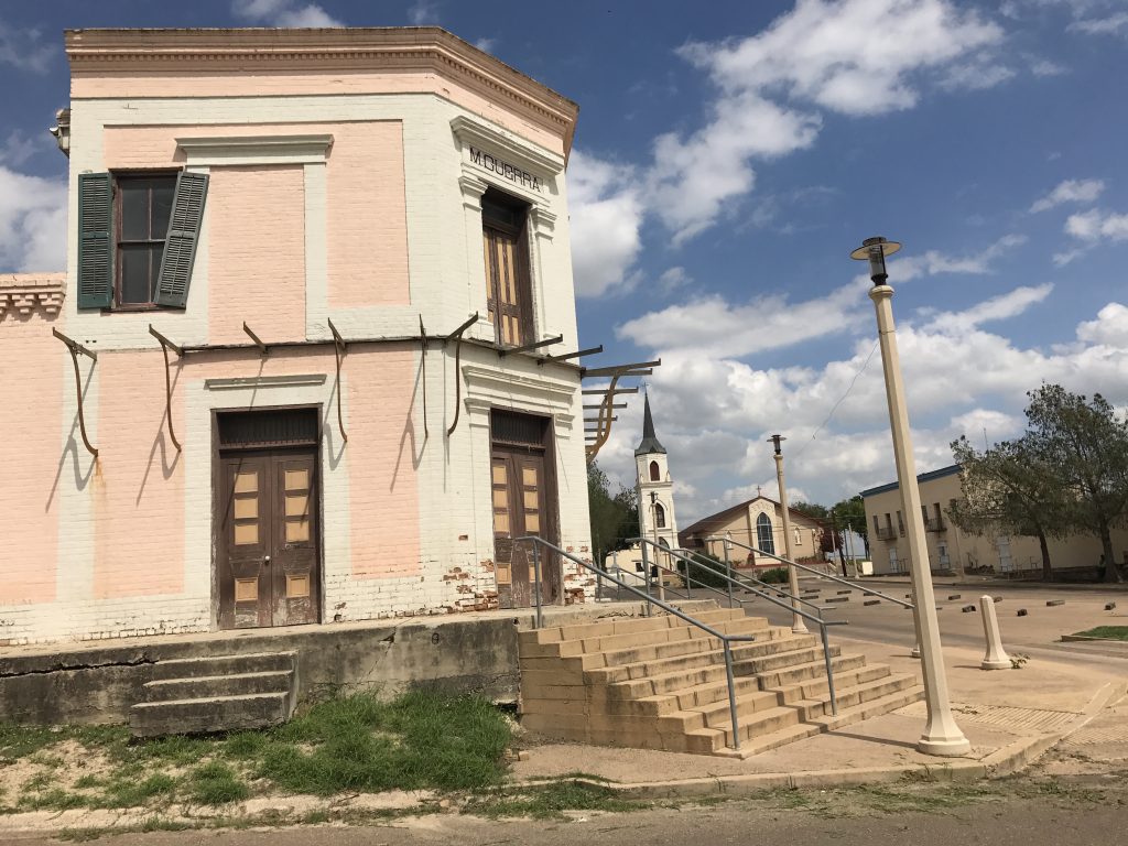 The Manuel Guerra commercial building once held iron balconies, a fusion of northern Mexico and New Orleans architecture.
