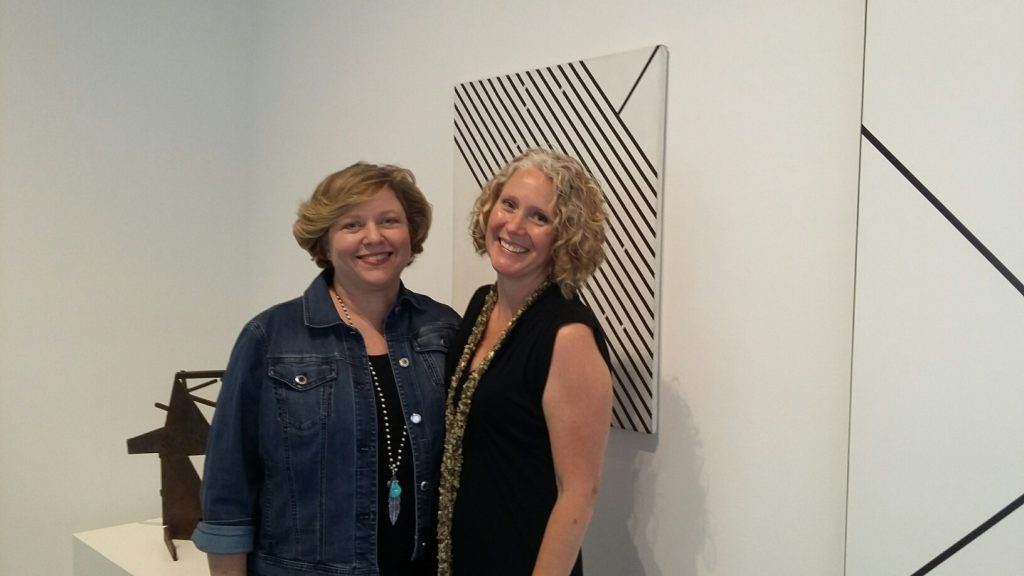 ATT executive Brooks McCorcle and Kristin Schwartz-Lauster at Carneal Simmons exhibition for Duayne Hatchett. Schwartz-Lauster co-curated from the artist's estate for this rising Design District player. 