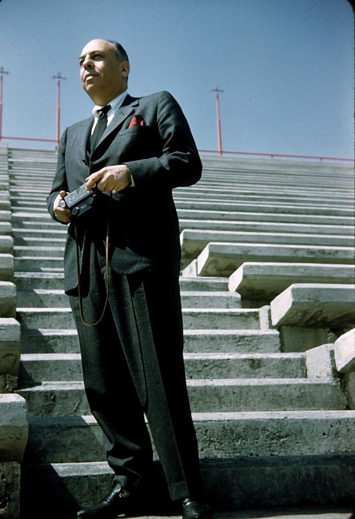 Stanley Marcus with his trusty Kodak Stereo camera at the stadium in Ciudad Universitaria, Mexico City, February 1957.