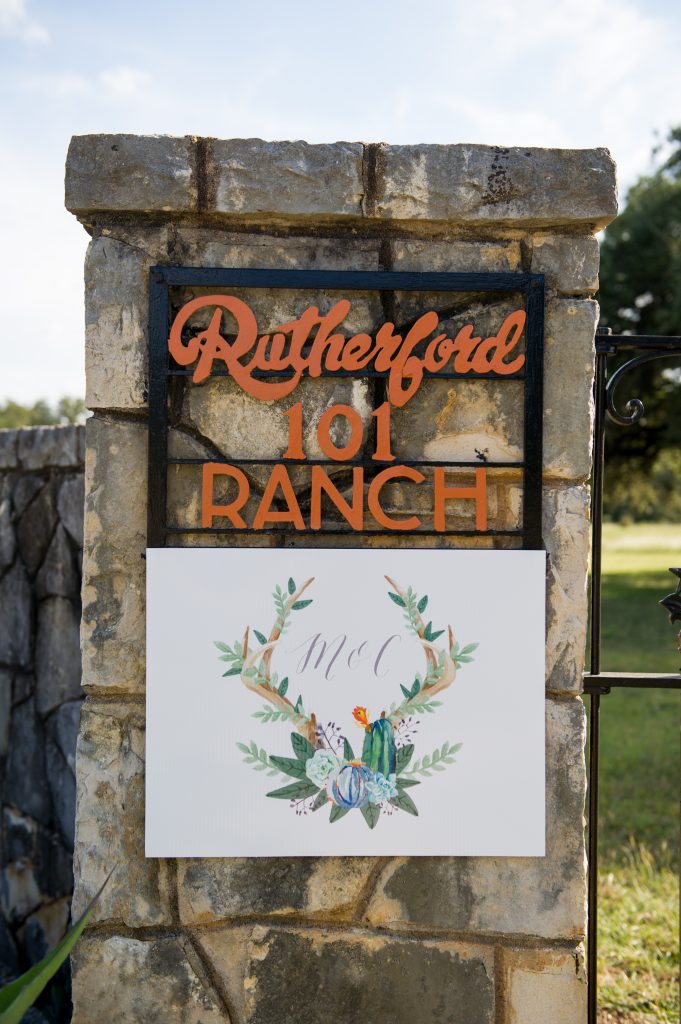 The setting, decked out with wedding flourishes: Rutherford Ranch, established 1948, Buda, Texas.