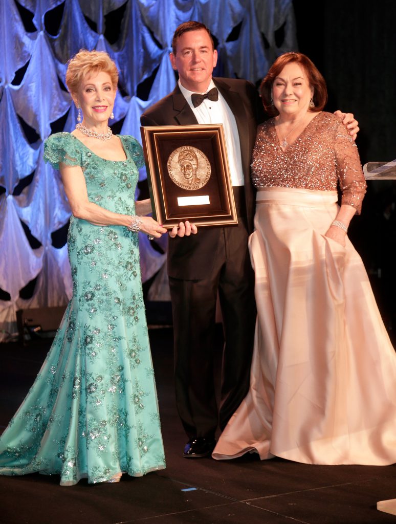 HOUSTON, TX - MAY 24:  Honoree Rosanette Cullen (R) accepts the Margaret Alkek Williams Humanitarian Award from Gala Committee Presenter Margaret Alkek Williams and CDO & EVP of UNICEF USA Barron Segar at the fourth annual UNICEF Audrey Hepburn® Society Ball on May 24, 2017 in Houston, Texas.  (Photo by Bob Levey/Getty Images for UNICEF)