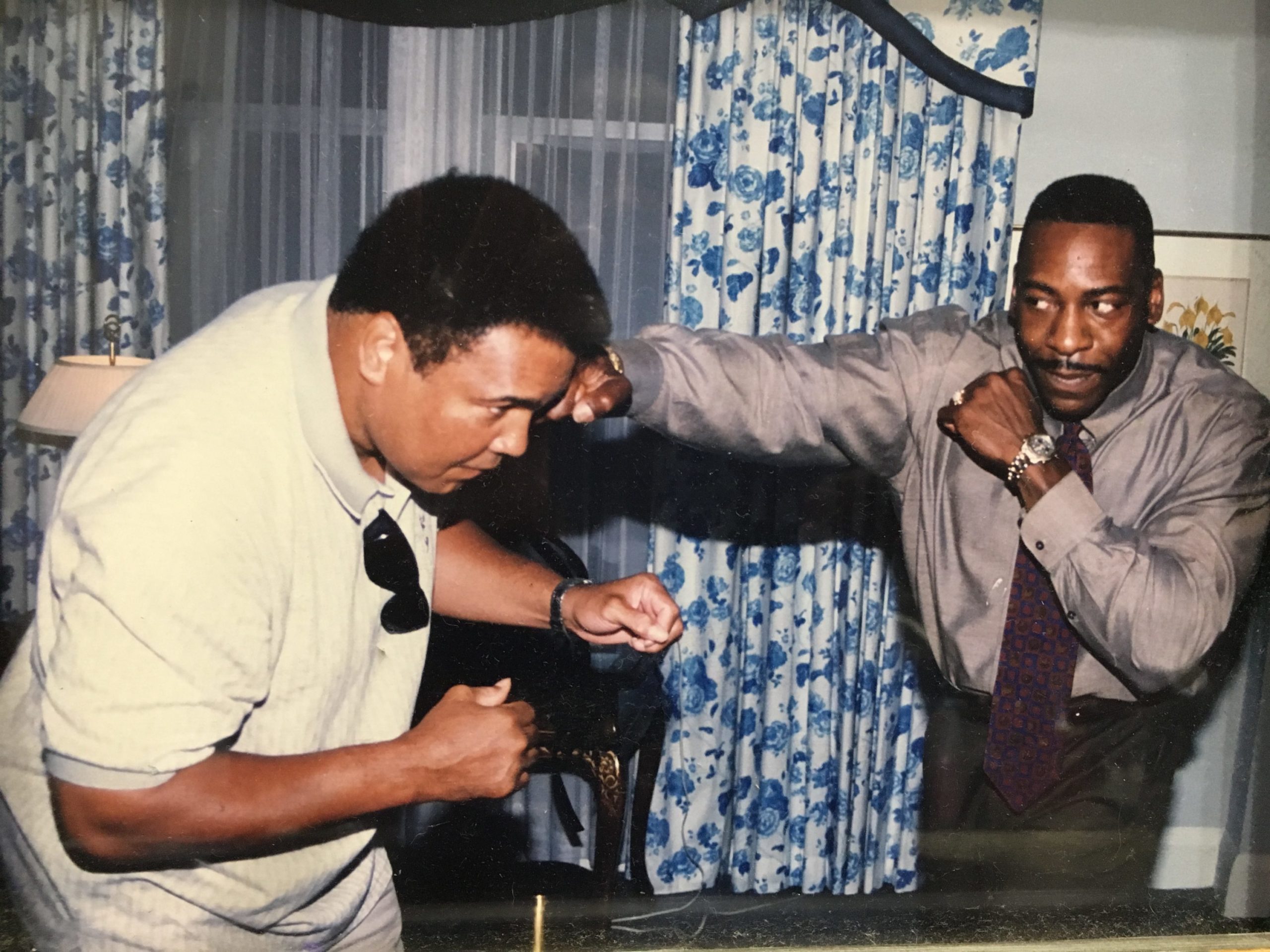 Booker T shared a moment (and friendly fisticuffs) with Muhammad Ali, seen here in a photo printed in the first issue of Found Me.