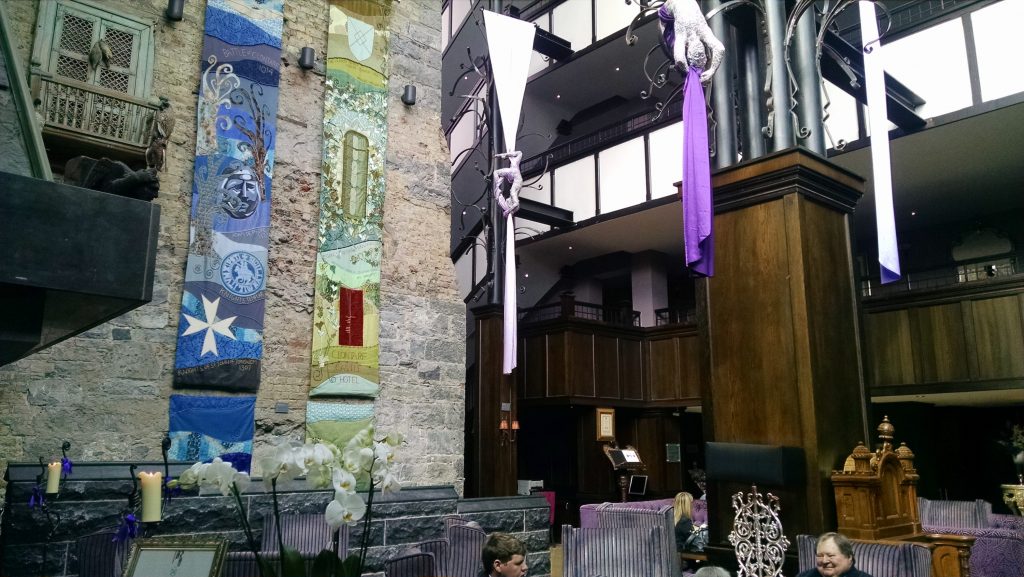 The interior of the lobby at the Clointarf Castle Hotel had innovative sculptures of acrobats hanging from the ceiling.