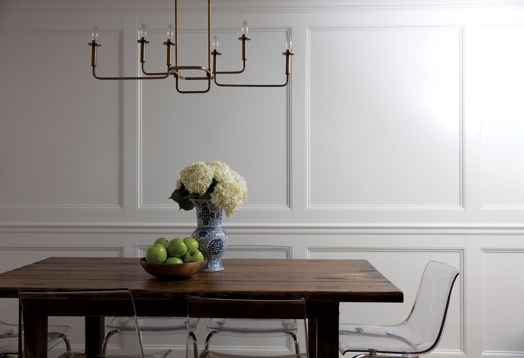 In the breakfast room, custom paneling, Restoration Hardware table, IKEA chairs. Kichler chandelier.