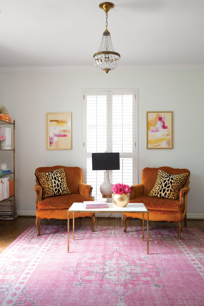 Knapp opted not to reupholster vintage orange chairs that belonged to her grandparents, given that orange is House of Harper's signature color. 