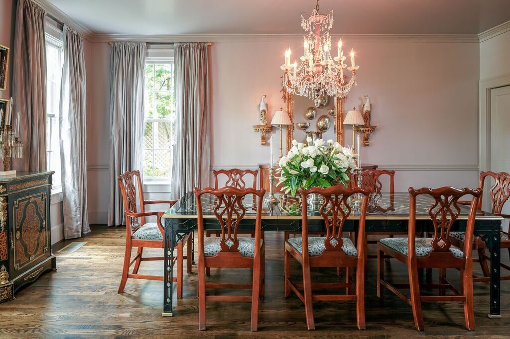 The home features gorgeous light fixtures and crown molding throughout. 