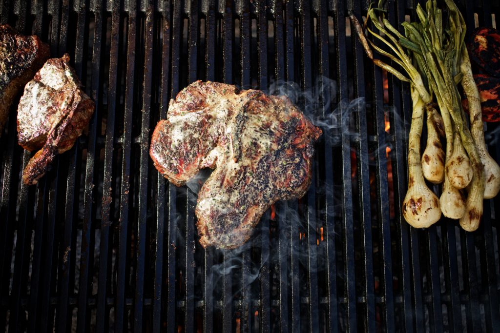 A newly installed wood fire grill enhances the Armadillo Palace menu. 