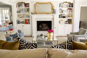 Knapp renovated the mantel and built-ins to modernize the newly open living room and add symmetry.