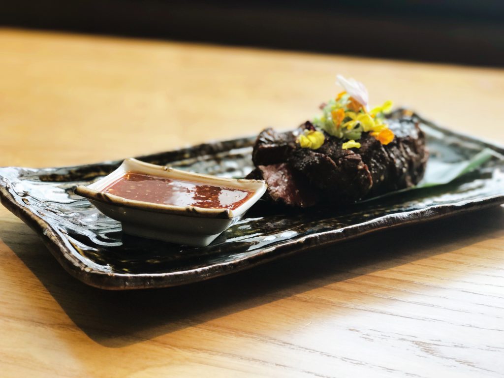 Roka Akor's prime filet is served with chili ginger sauce. 