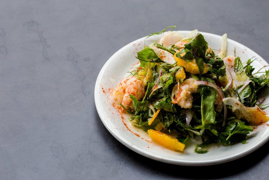 Marinated shrimp salad with shaved vegetables and citrus vinaigrette