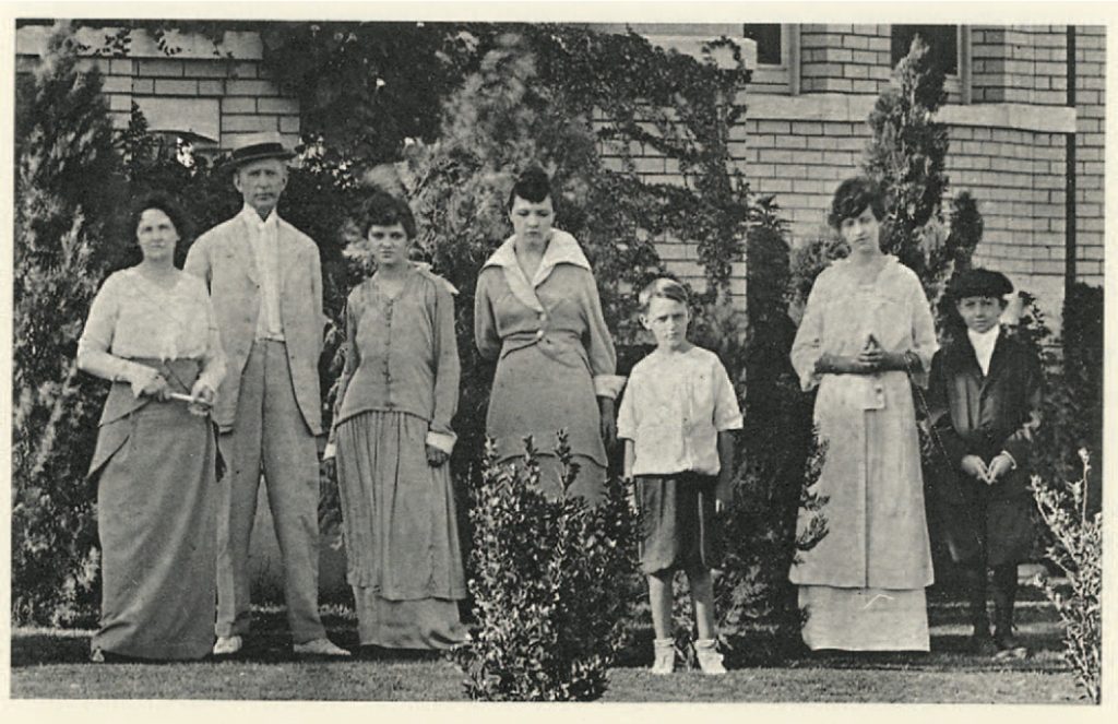 The Link Family on the lawn of the mansion