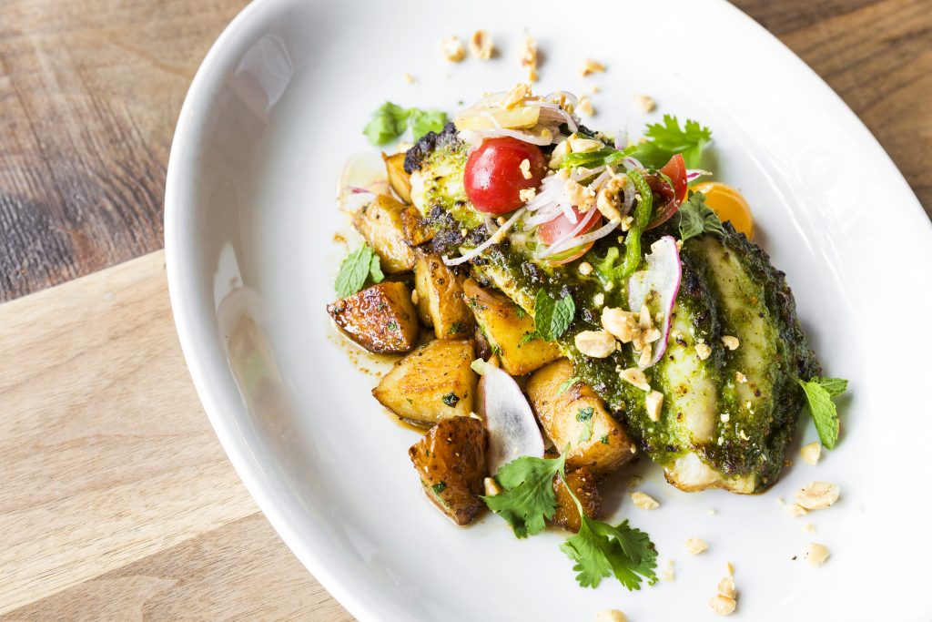 Vietnamese peanut pesto-crusted red fish served with lemongrass-glazed potatoes