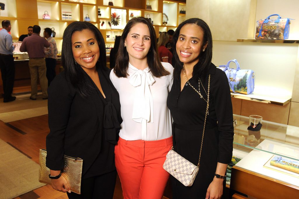 From left: Ashley Seals, Holly Grice and Hannah Thibodeaux at the release party for the Tambour Horizon watch at the Louis Vuitton store in the Galleria Tuesday July 11, 2017. (Dave Rossman Photo)