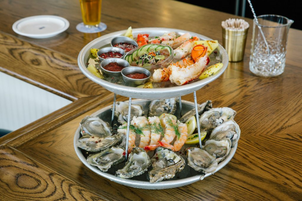 For $90, "The Royal" tower offers a sampling of each item on the raw bar menu - along with a poached lobster tail 