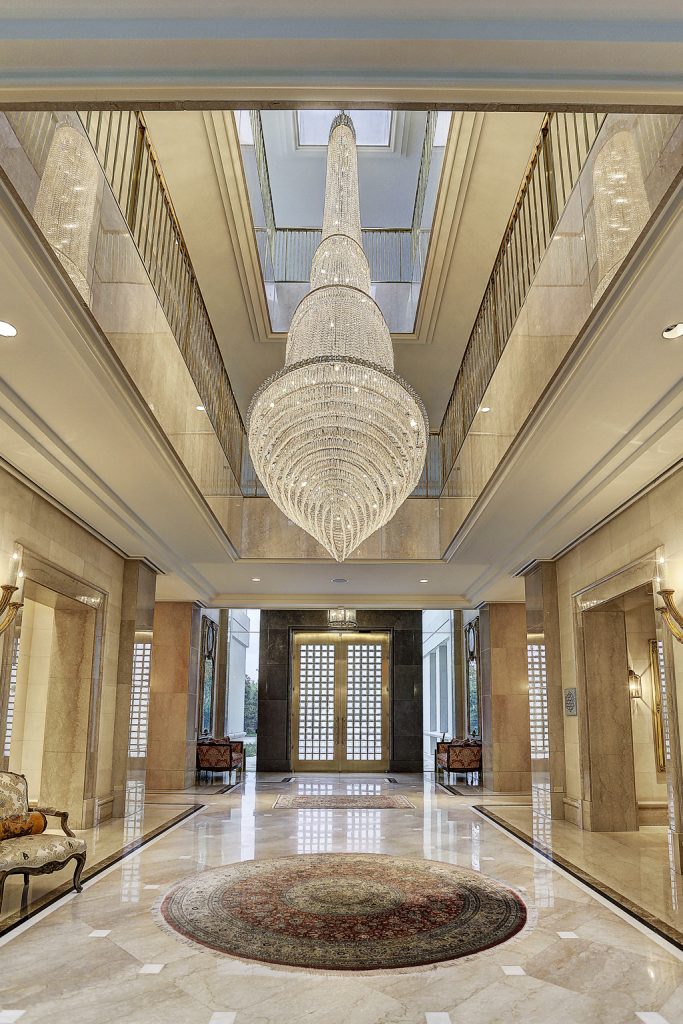 A view of the grand foyer toward the solid brass entry at 1000 Kirby