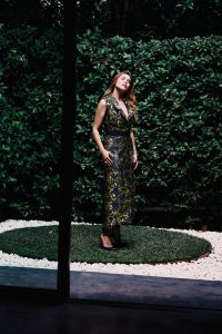 Cockrell in an Erdem sleeveless coat $3,210, at Forty Five Ten.