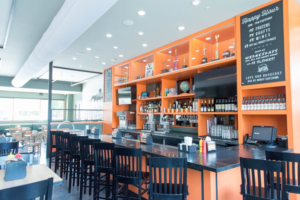 Grab a drink in Bernie's teacher's lounge. 