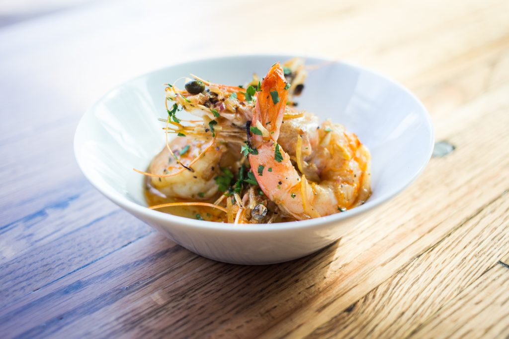 A'Bouzy's Gulf shrimp are enhanced with  garlic butter,
preserved lemon, and capers.
