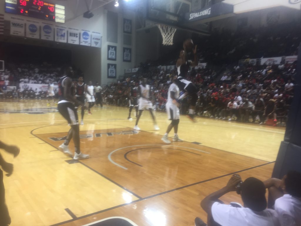 Chris Paul drives to the hoop in James Harden's charity game.