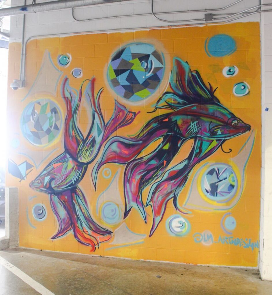 The colorful murals have an unexpected location: a parking garage on Victory Park Lane. 