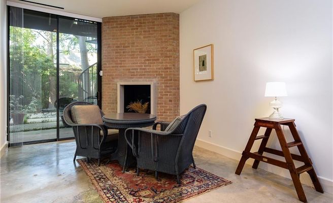 The house has two modern fireplaces. 