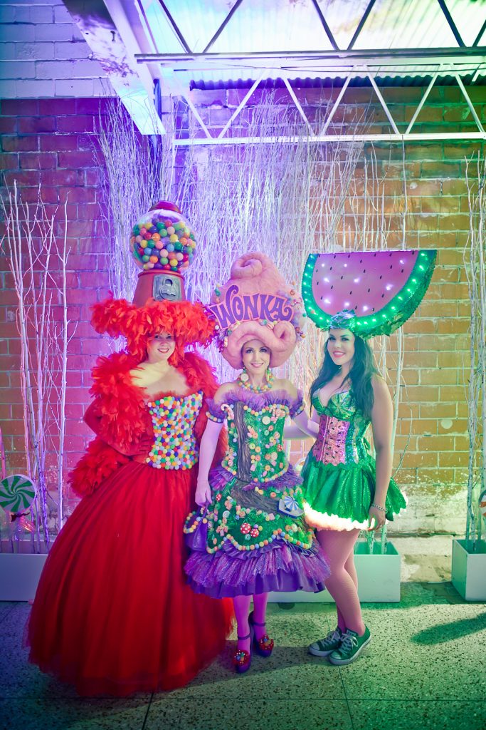 A gum ball machine, Willy Wonka, and a watermelon, make for a the perfect smorgasbord at the Gumball Gala, 2015. (Photo Morris Malakoff)