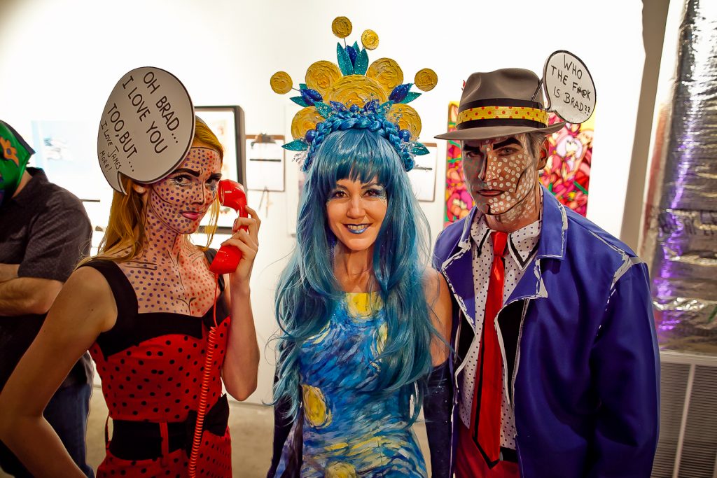 Two homages to Roy Lichtenstein sandwich Marita Fairbanks, in a stellar Vincent Van Gogh ensemble, at 2016's Paint Ball Gala. (Photo Morris Malakoff) 