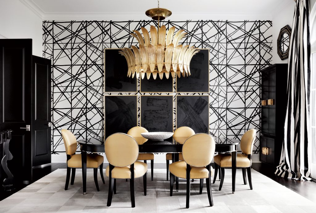 Dining room wallpaper by Kelly Wearstler, antique Venetian glass chandelier, lacquered French cabinets and table from Shabby Slips, vintage French chairs.